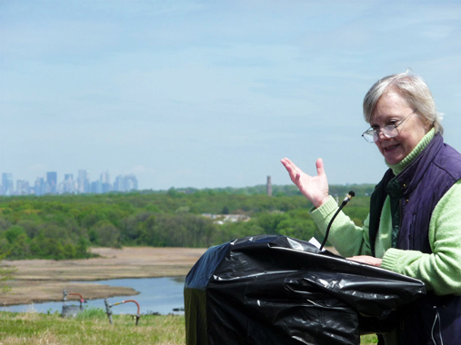 Beth Gorrie, Director of Staten Island OutLOUD, addressed the crowd atop North Mound last Saturday.