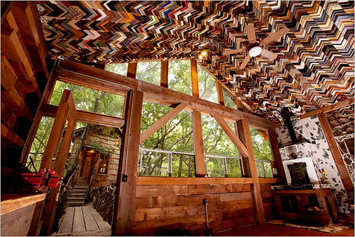 Phillips' company built this cieling for a low-income house in Huntsville, Texas out of thousands of picture frame corners.