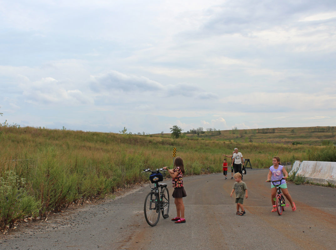 Visitors walked and biked across normally closed sections of the landfill-to-park project at Discovery Day.